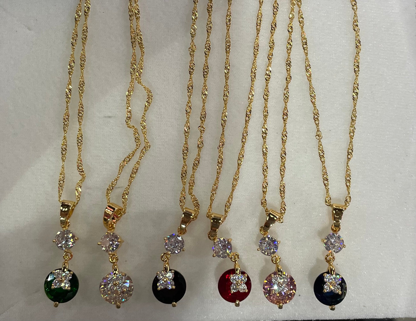 Juego de collar y aretes con dije en forma Circular - Bling Bling