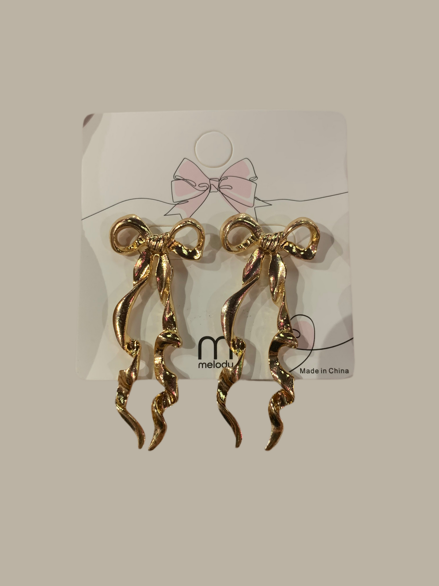 Aretes largos de moño - Bling Bling