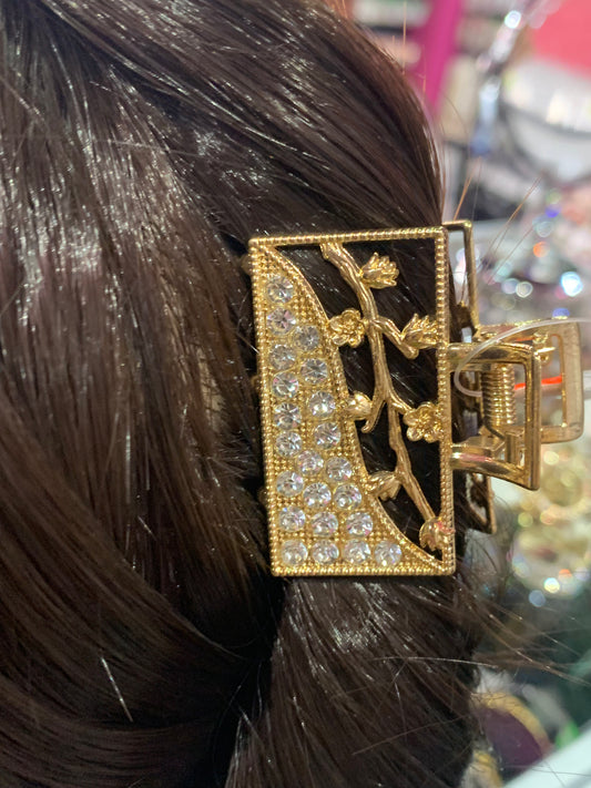 Mini pinza metálica en color dorado - Bling Bling